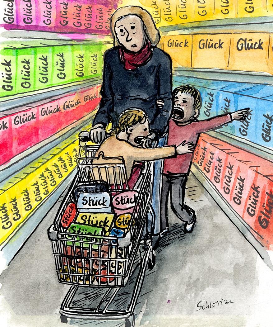 Mutter mit zwei Kindern beim Einkauf